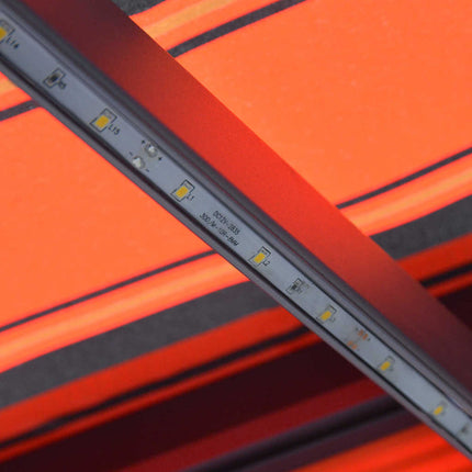 Markis manuellt infällbar med LED 300x250 cm orange och brun