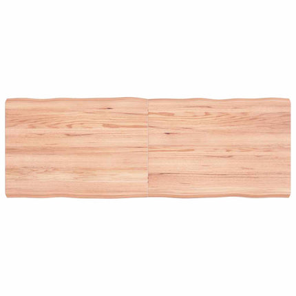 Bordsskiva ljusbrun 140x50x(2-6) cm massivt trä levande kant