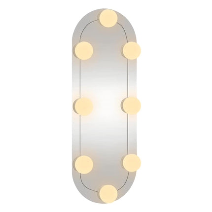 Väggspegel med LED-belysning 15x40 cm glas oval