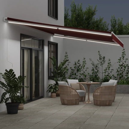 Markis manuellt infällbar med LED vinröd 600x350 cm