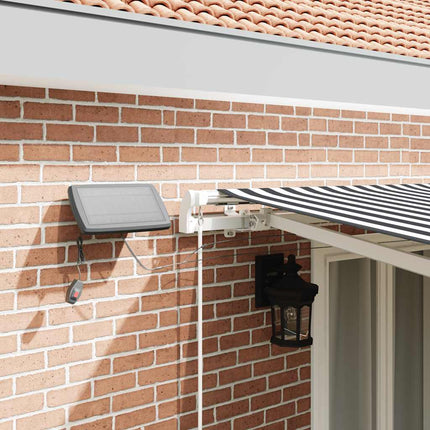 Markis manuellt infällbar med LEDs antracit och vit 450x300 cm