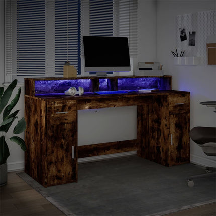 Skrivbord med LED rökfärgad ek 160x55x91 cm konstruerat trä