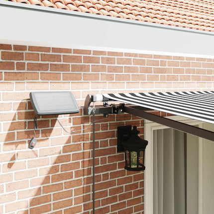 Markis manuellt infällbar med LEDs antracit och vit 400x300 cm