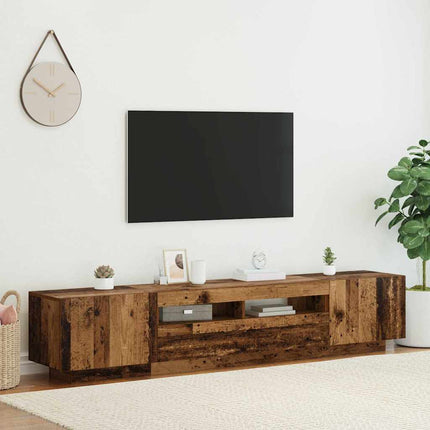 TV-bänk med LED-lampor åldrat trä 200x35x40 cm konstruerat trä